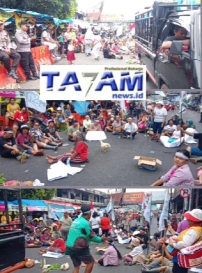 Ratusan pedagang pasar horas(P2H) melakukan aksi unjuk rasa dengan memblokade jalan Merdeka pematang siantar. - www.tajamnews.co.id