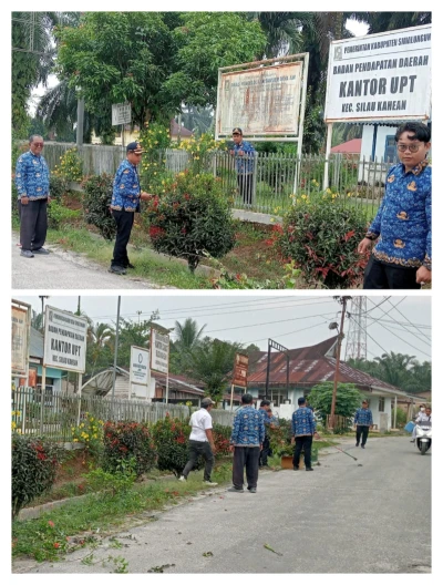 *PLT Camat Silou Kahean Johansen Damanik SH Pimpin Gotong Royong Bersama Pegawai Jaga Kebersihan Lingkungan Kantor Camat* - www.tajamnews.co.id